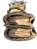 Lacarmenbags black faux leather handbag interior with champagne lining, zippered center compartment, and gold hardware